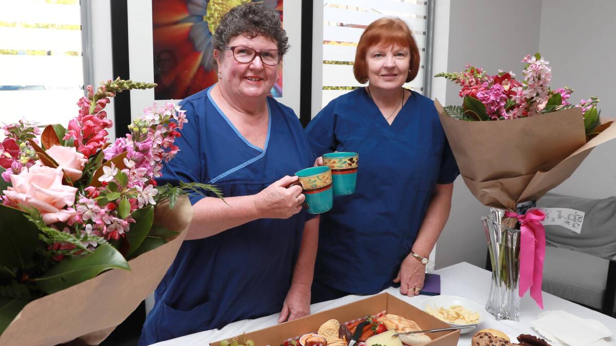 A FOND FAREWELL: Registered nurses Wendy Jarick and Sharyn O'Kane enjoy their send off at the Riverina Day Surgery before starting retirement. Picture: Les Smith