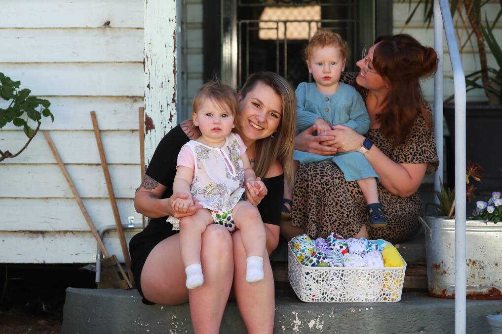 IT'S A WRAP: Wagga mum Leanna Gow and her daughter Abigail Thomson and Alannah Huntly with her daughter Matilda Mavor both use reusable nappies. Picture: Emma Hillier