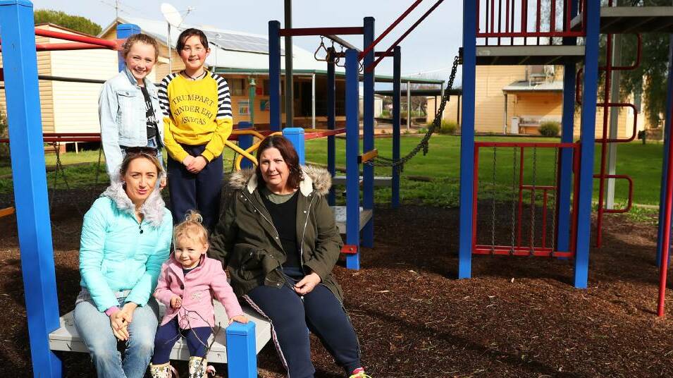 SAVE OUR SCHOOL: Sara Jones, Kilarney Trethow, Summer Jones, Hayley Cahill and Linda Moloney at the Collingullie Public School which closed three years ago. Picture: Emma Hillier