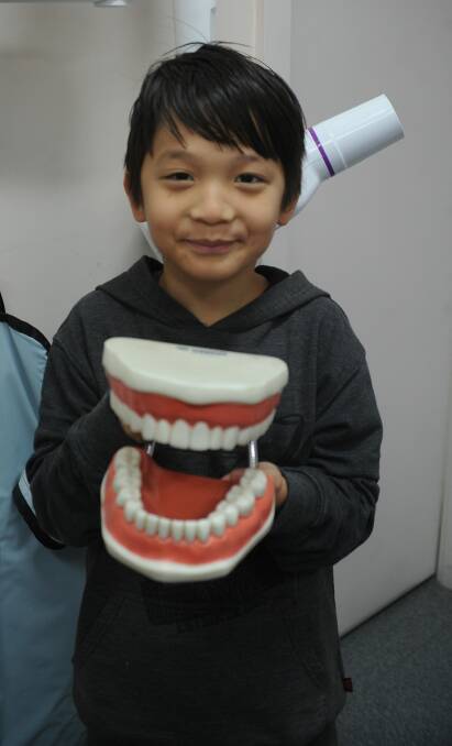 HEALTHY TEETH: Wagga's Wangram Redamwang visiting the dentist for a check up. Picture: Daina Oliver
