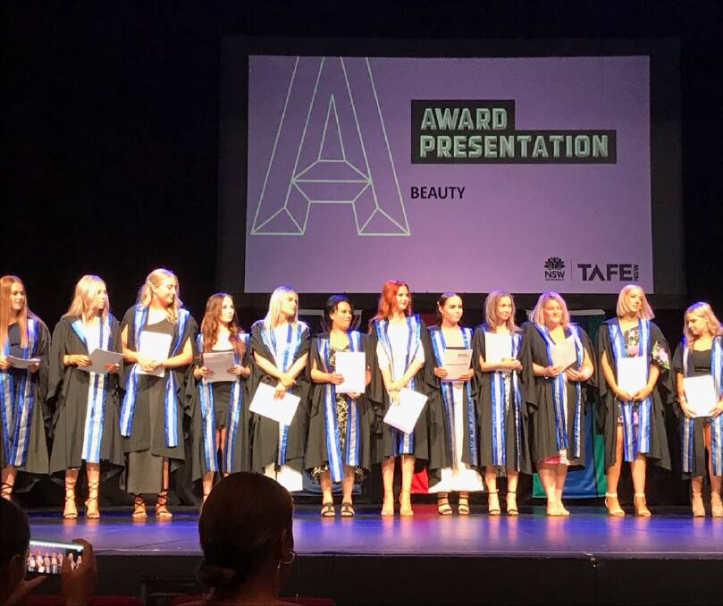 BIG ACHIEVEMENT: TAFE NSW Wagga's Diploma of Beauty students during the graduation ceremony at the Civic Theatre on Tuesday. 