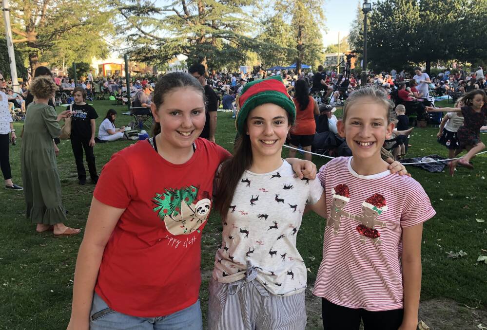 Nevaeh Collier, Joet Collier and Linley Elliot at Christmas Carols in the Park. Picture: Daina Oliver