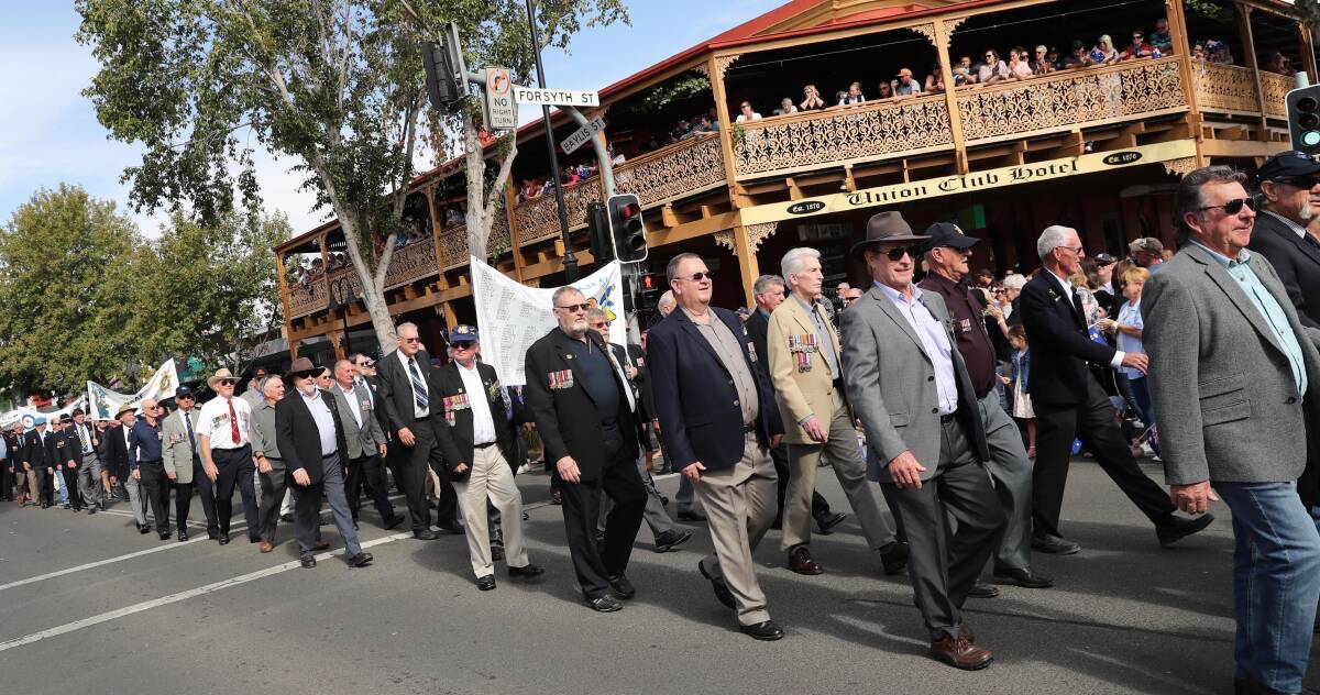 MARCHING TOGETHER: Wagga community marching during the Anzac Day 2018 ceremony. Picture: Les Smith