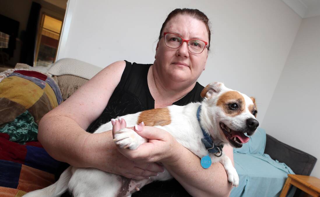 CONCERNED OWNER: Wagga's Catherine Daly with her dog Lucy, which she adopted from the Glenfield Animal Shelter without being told of the dog's health problems. Picture: Les Smith 