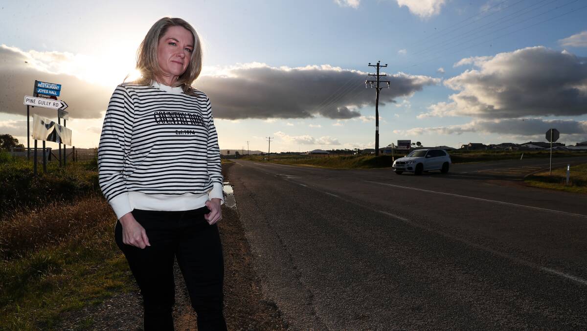 Estella resident Shantal Armstrong standing at the intersection of Old Narrandera and Pine Gully roads where a proposed roundabout could be installed. Picture: Emma Hillier
