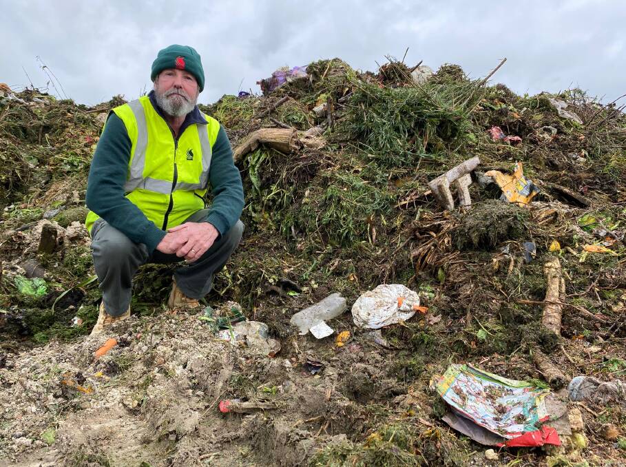 CONTAMINATED: Gregadoo Waste Management Facility manager Geoff Pym inspects the latest pile of FOGO waste. Picture: Daina Oliver