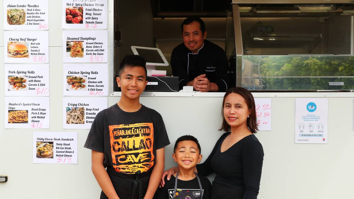 OPEN FOR BUSINESS: Shepherd's Hub chef Lito Pastor with his sons Pierre and Joz and his wife Maricel have opened a family operated food truck business. Picture: Emma Hillier 