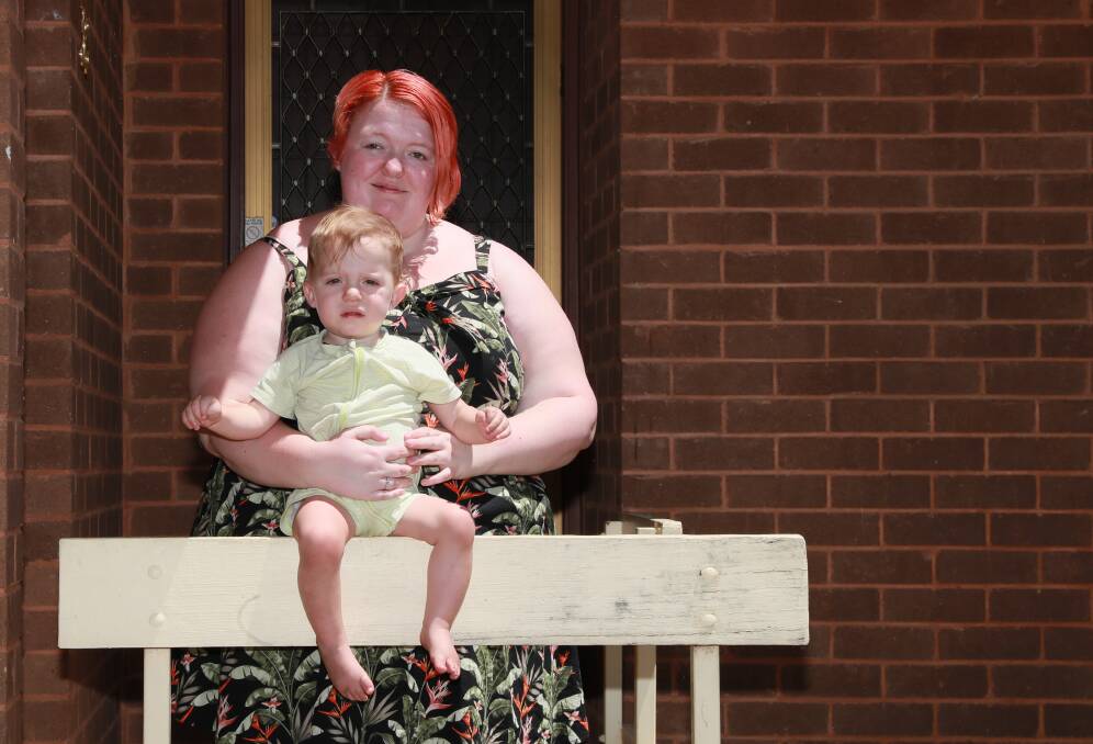 IT'S ABOUT TIME: Amanda Richter with her 15-month-old son Jayden live in Tolland and completely support plans to transform the rundown suburb, but wonder if that will be enough. Picture: Les Smith 