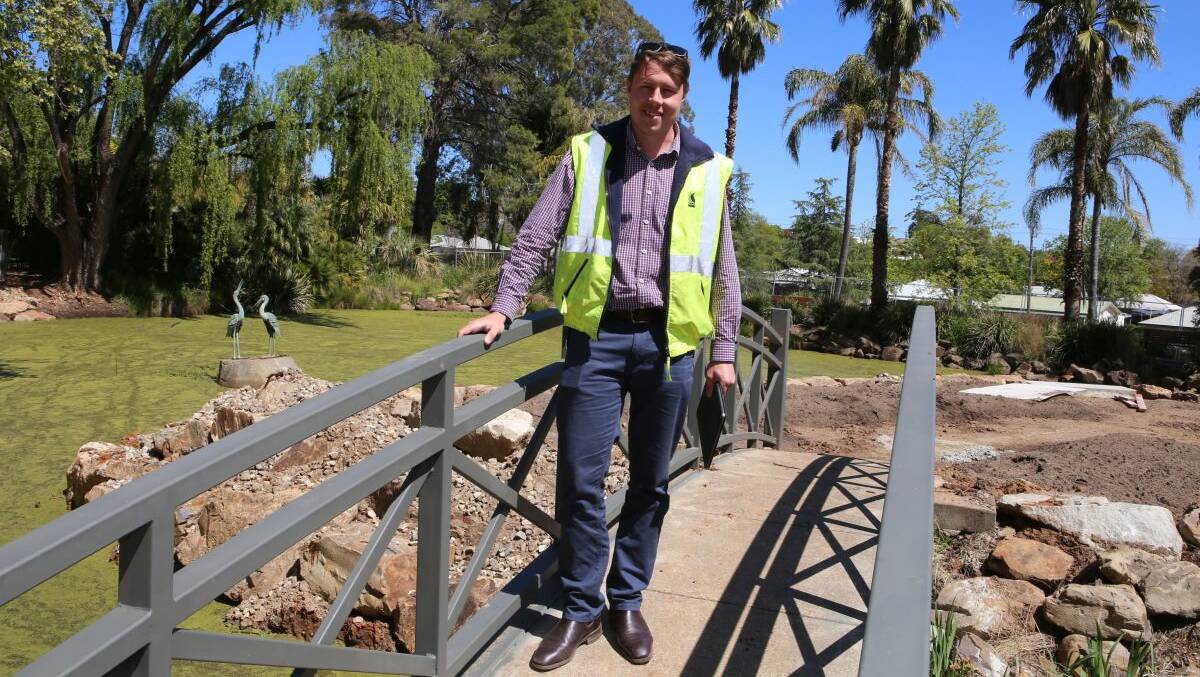 COMING TOGETER: Wagga City Council project coordinator Tom Lemerle inspects the finishing stages of the work at the Brolga Pond area of the Botanic Gardens. Picture: WWCC