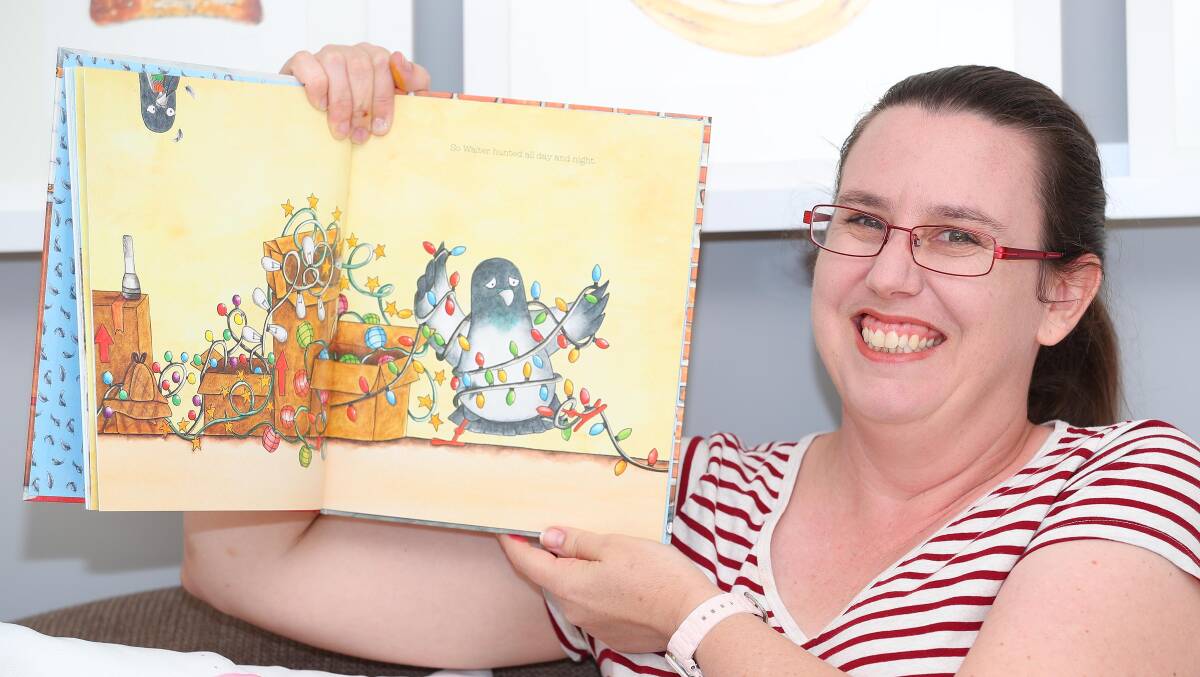 Illustrator Suzanne Houghton with her book, Walter Pigeon, hope to open the eyes of Wagga residents to other art forms. Picture: Kieren L.Tilly