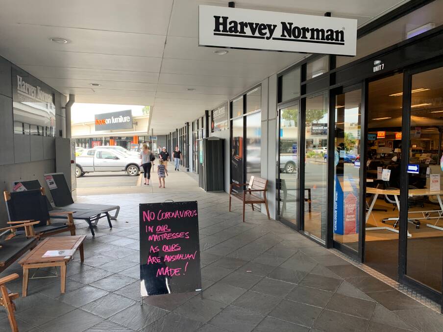 'No coronavirus in our mattresses': Harvey Norman sign draws criticism