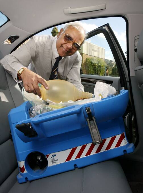 PREPARED: Dr Reddy (left), who carried a resuscitation kit in his car, received an OAM in 2004. 