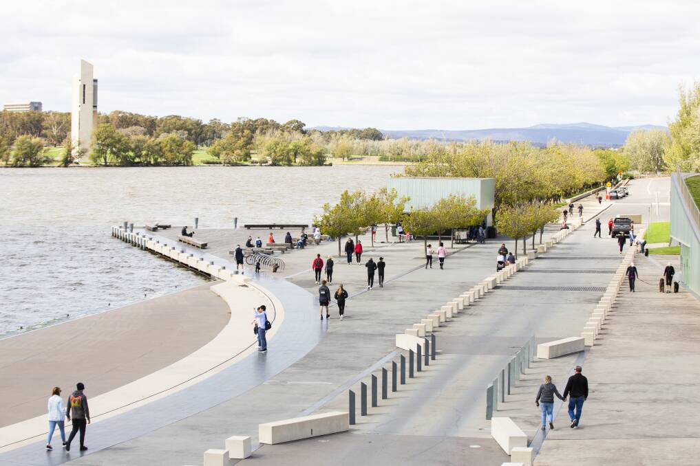People exercise in Canberra along Lake Burley Griffin. Picture: Jamila Toderas