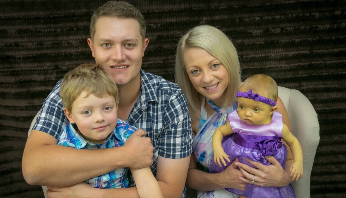 Addison Curry with dad Mitchell, brother Liam and mum Brodie Cottam before her surgery. Picture: Kris Daley Photography