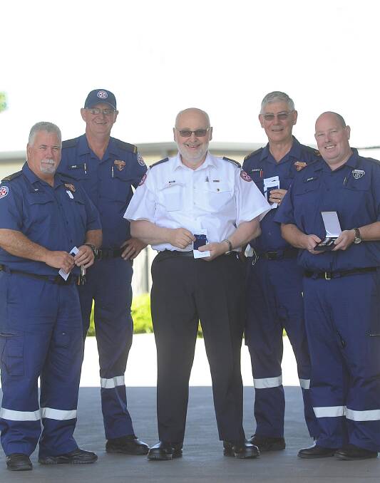Long-serving Ambulance Service of NSW personnel (from left) Ian Hanna, Phil Hoey, Gary Dyson, Robert Marmont and David Nolan.