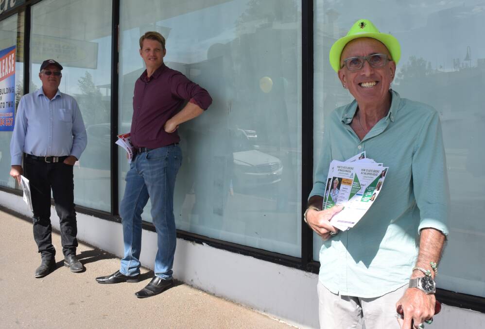 The Greens' Ray Goodlass, right, with Seb McDonagh from the Shooters, Fishers and Farmers and Country Labor's Dan Hayes.