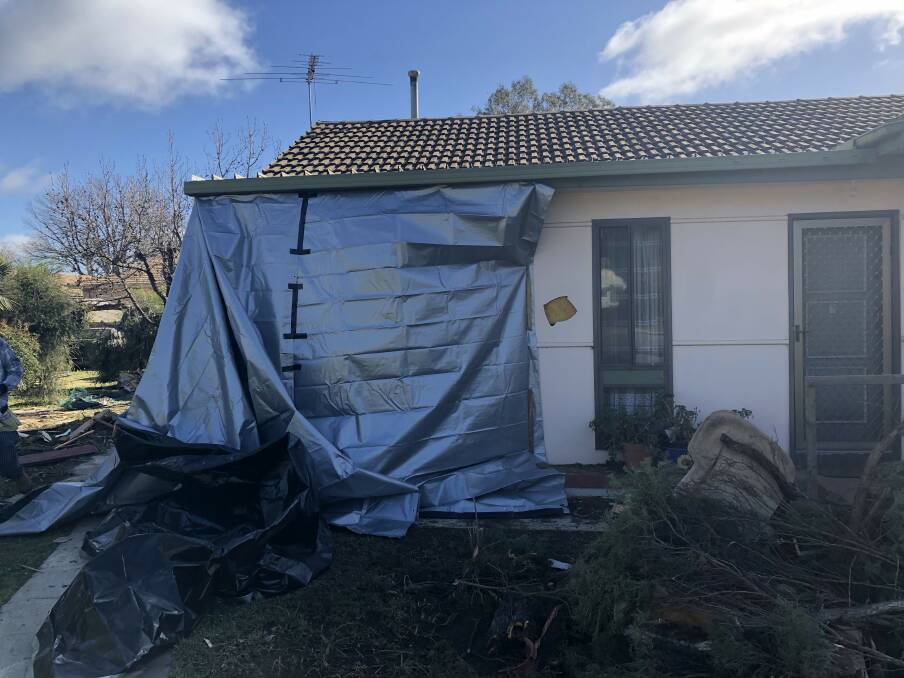 DAMAGE: The owner of this central Wagga home had left the room just minutes before a car ploughed into it.