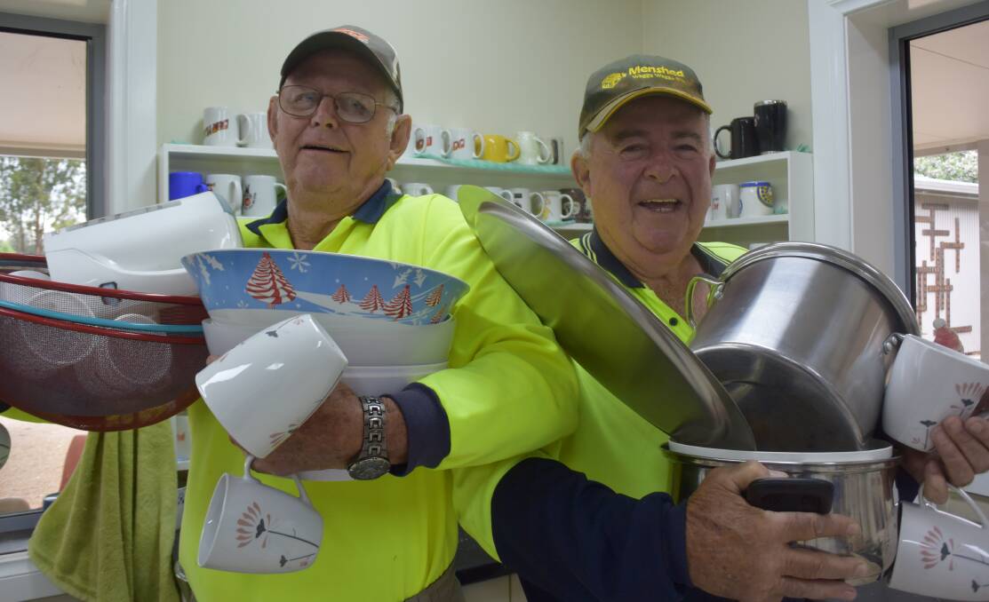 Geoff Marks and Peter Quinane say Wagga people are gearing up for the garage sale. Picture: Jody Lindbeck