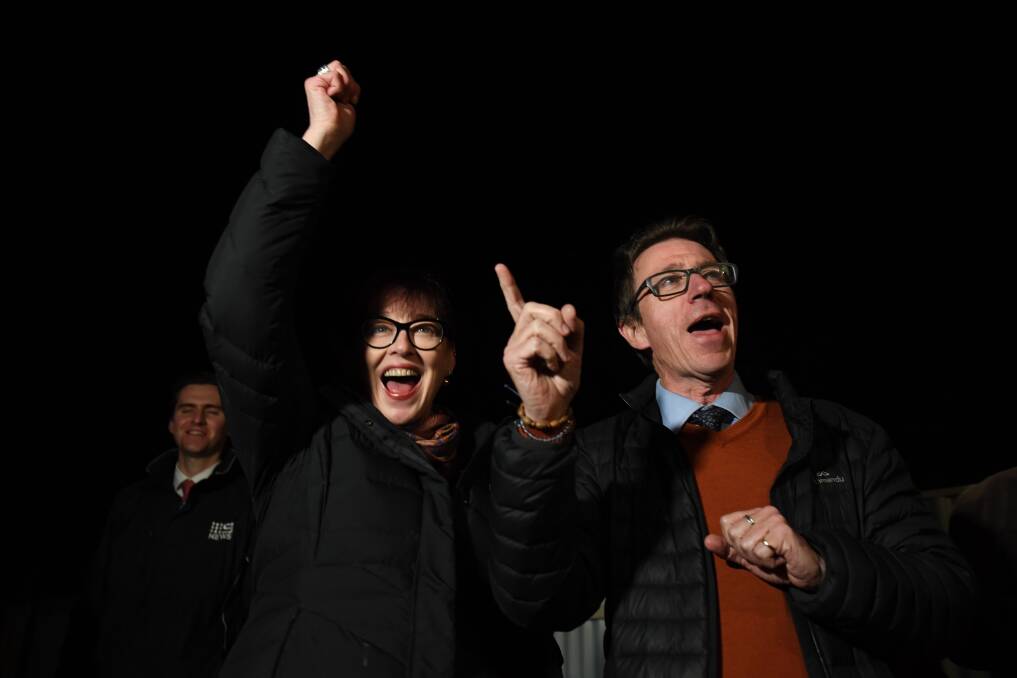 Joe McGirr and his wife Kerin Fielding celebrate what looks to be a victory on the night of the Wagga byelection Photo: Nick Moir.