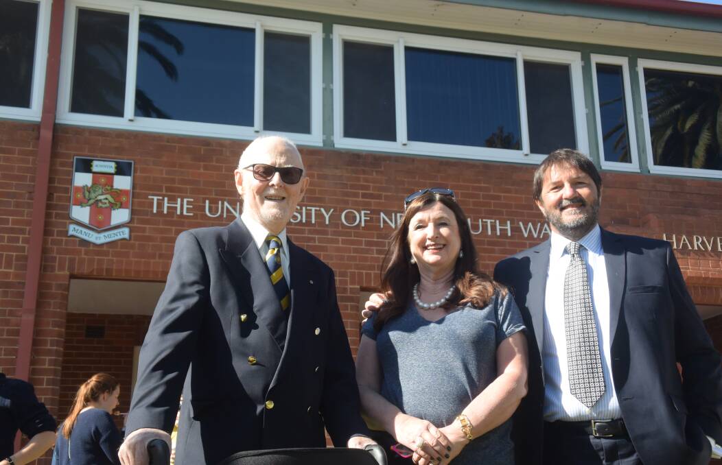 Head of UNSW Medicine’s Wagga campus, Associate Professor John Preddy (right) with Associate Dean Lesley Forster, with former head Sandy Reid (left), celebrating 15th anniversary of the school's official opening, which fell the day after the Budget announcement.