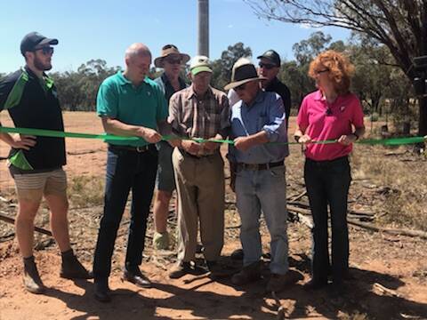 IT'S OFFICIAL: The new mobile base station at Mimosa, near Coolamon, is officially opened by Telstra staff and community members.