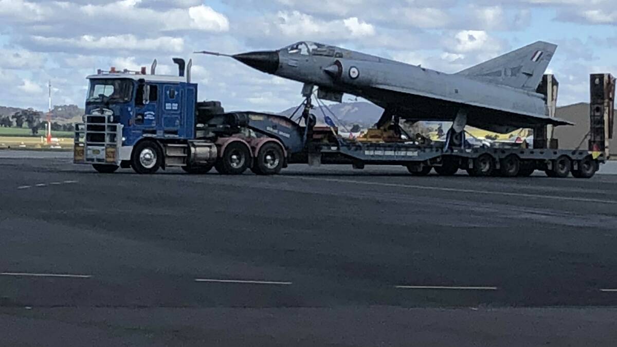 WIDE LOAD: This Mirage aircraft had a road trip from Point Cook near Melbourne to RAAF Base Wagga, where it will be stored away from coastal conditions.