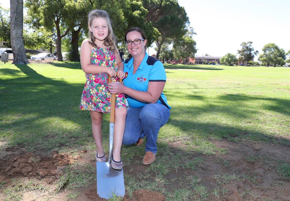 SOD TURNING: Milla Campbell, 6, from Wagga and Mel Jamieson from Teys Australia Wagga at the cermony. Picture: Kieren L Tilly