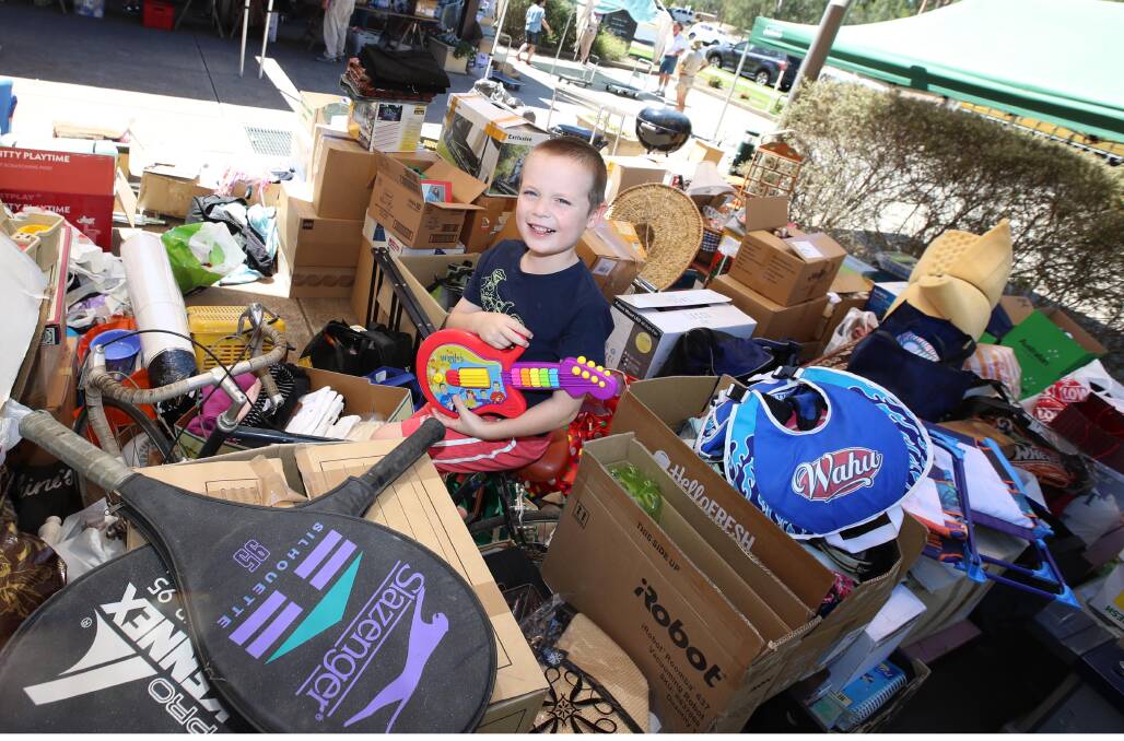 TREASURE TROVE: Tyson Burkinshaw, 5, looks for toys in the huge assortment of donated items. Pictures: Les Smith
