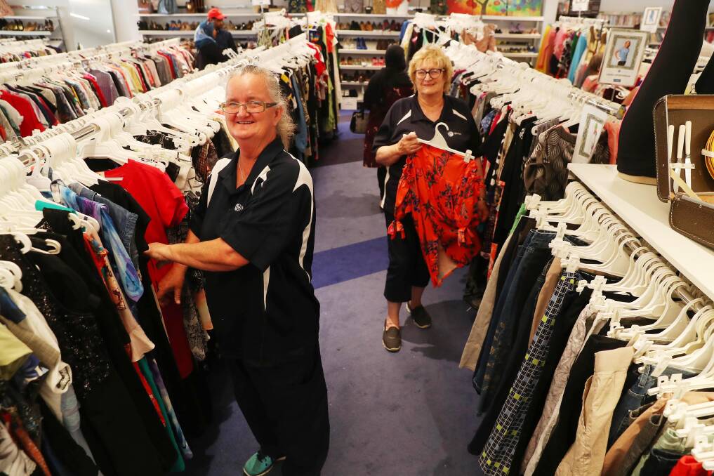 CHRISTMAS IS COMING: St Vincent de Paul Wagga volunteers De Roberts and Carole Parkinson are starting to get ready for Christmas. Picture: Emma Hillier