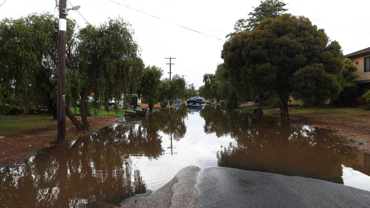 DOWNPOUR: Water covers the road at the intersection of Forrest Street and Brunskill Road, Lake Albert. Picture: Emma Hillier