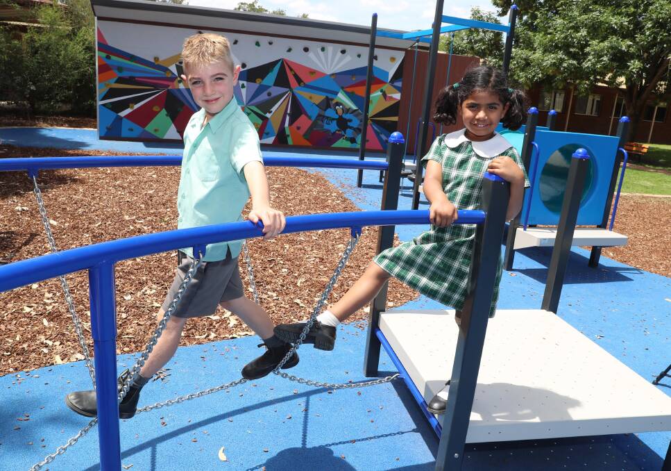 TOP TIPS: Riley Goldsworthy and Hazel John, both aged 6, are sharing some advice now they're nearly finished kindergarten. Picture: Les Smith