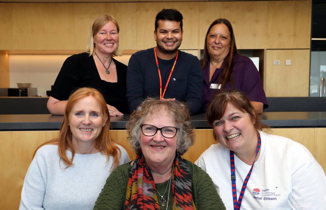 SAYING GOODBYE: Debbie Scadden (front centre) with some MLHD colleagues, Toni Stubbs, Denise Garner, Nathaniel Alexander, Jackie Brodie and Karen Nelson. Picture: Les Smith