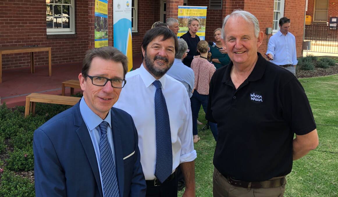 Member for Wagga Joe McGirr (Left) and Wagga mayor Greg Conkey (right) with John Preddy from the rural medical school at the funding announcement.