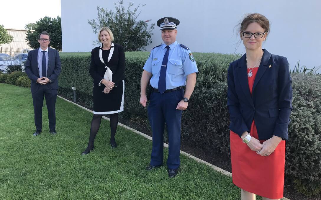 Member for Wagga Joe McGirr, Murrumbidgee Local Health District chief executive Jill Ludford, Superintendent Bob Noble from Wagga police and Member for Cootamundra Steph Cooke spread out for a press conference. Picture: Jessica McLaughlin