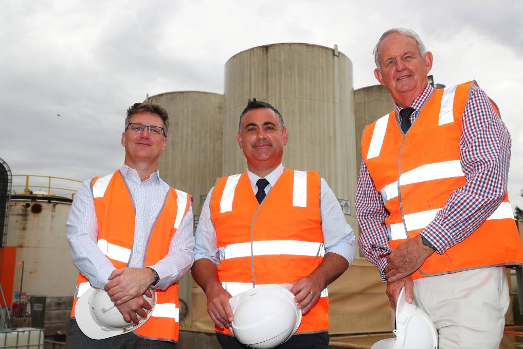 Tim Rose, the managing director of Southern Oils, (right) takes Deputy Premier John Barilaro (centre) and Wagga mayor Greg Conkey on a tour of the Bomen facility.
