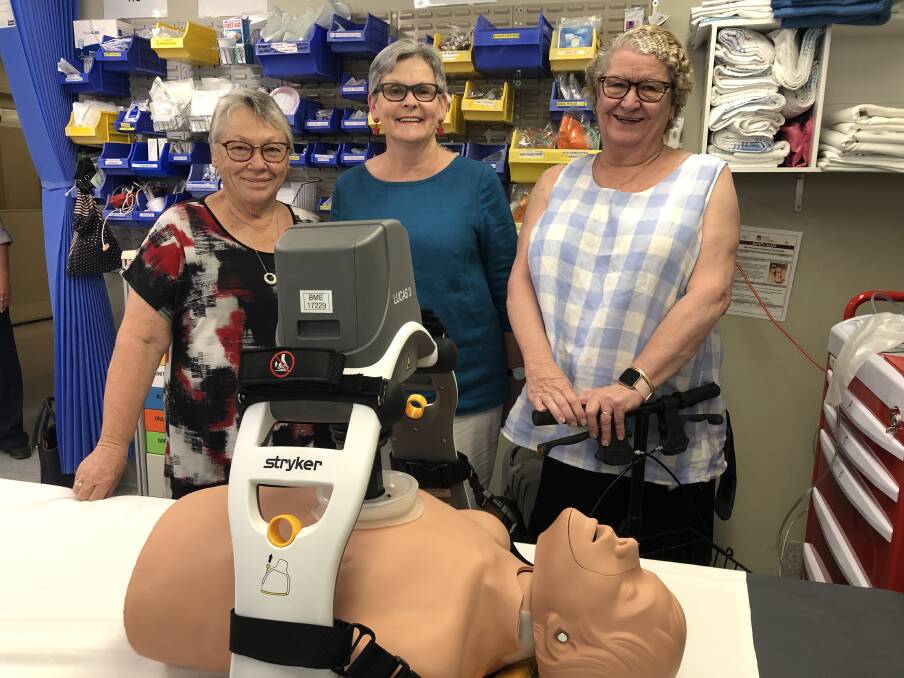 Cheryl Crocker and Kathy Goss from the Coolamon Ganmain Hospital Auxiliary and facility manager Pam Samways with the new Lucas Stryker chest compression machine.