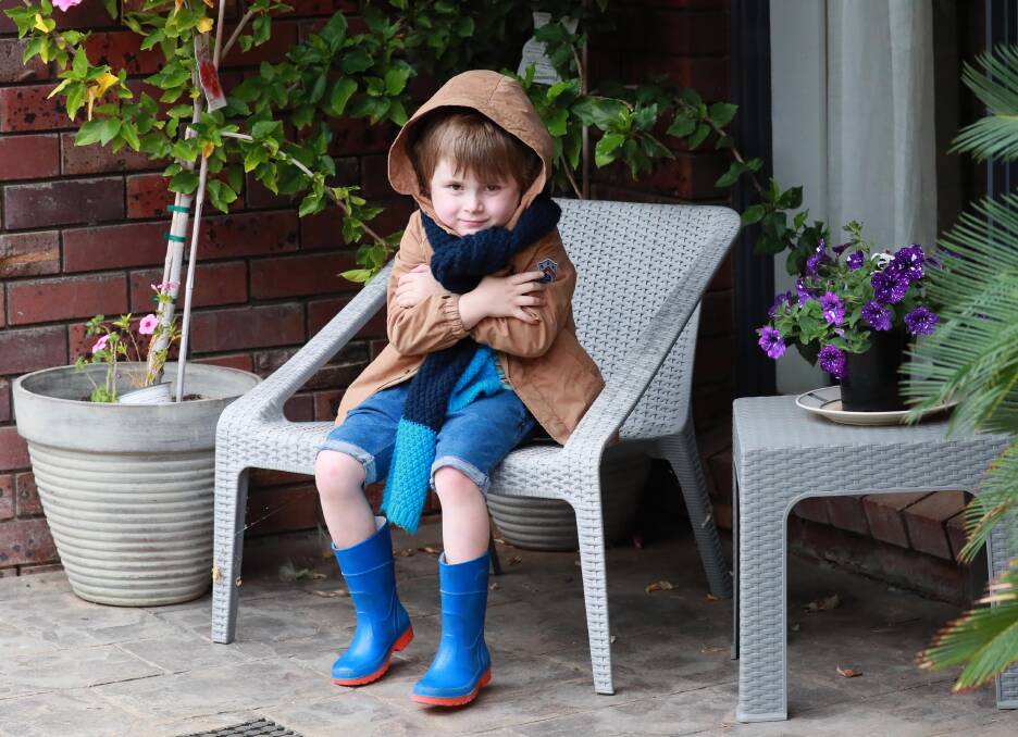 Victor Brady, 5, rugs up against the cold. Picture: Les Smith.