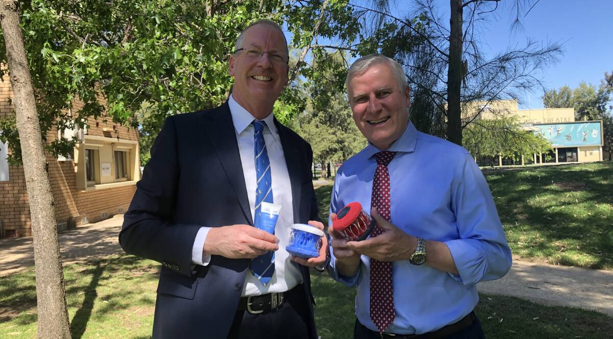 Wagga dentist Mark Wotherspoon (left) and Deputy Prime Minister Michael McCormack with Dr Mark's Hygenie, an invention that was five year's in the creation.