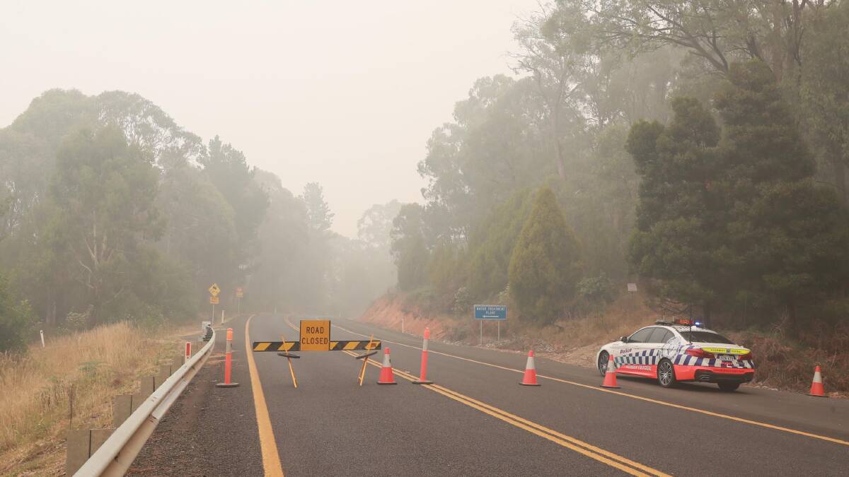 Bushfires closed the road between Batlow and Tumbarumba on New Year's Eve.