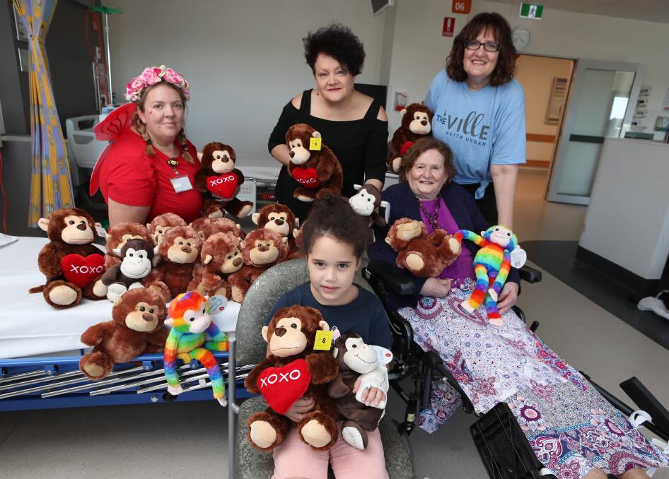 Taya-Rose Martin, 6, with Kelly, Murray, Judy-Ann Emberson, Leanne Higham, Margaret Higham and a lot of cuddly friends. Picture: Les Smith