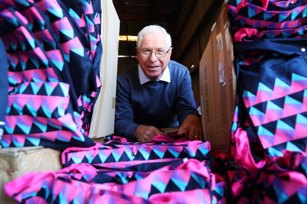 Wollundry Rotary's Doug Sutton with some of the completed rider bags. Picture: Emma Hillier