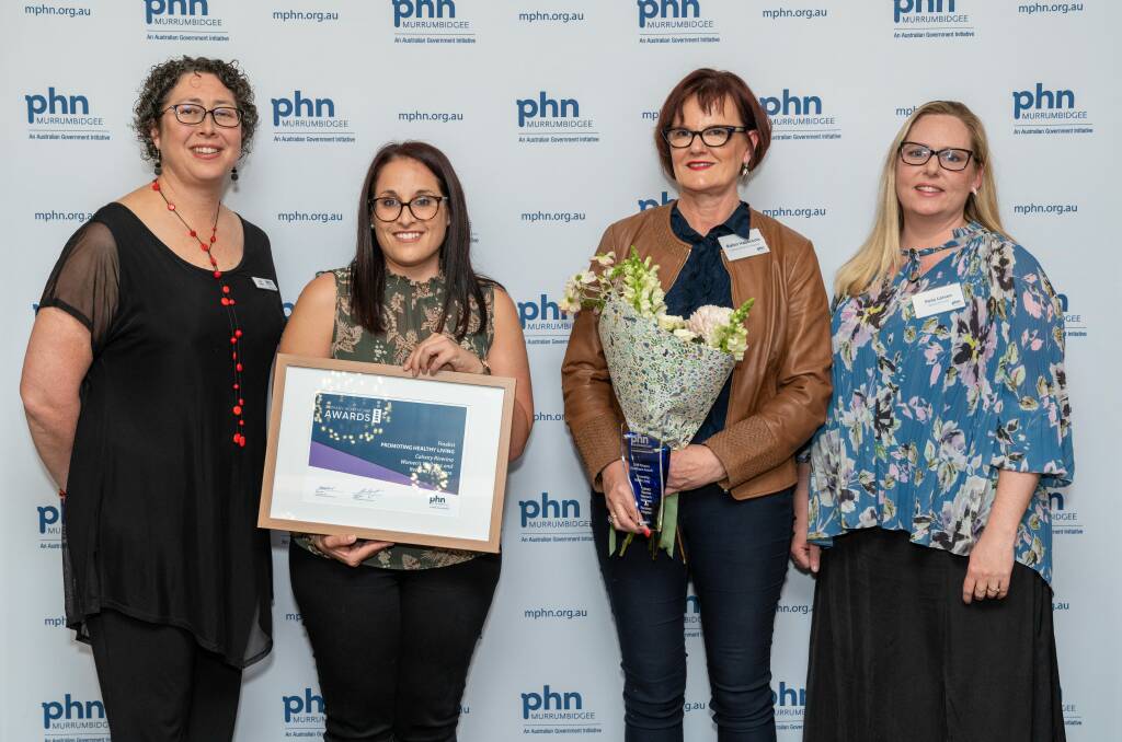 MPHN board chairwoman Jodi Culbert, program coordinator Kylie Falciani, general manager of Calvary Riverina Hospital, Robin Haberecht, and MPHN board director Peta Larsen. Calvary Riverina Hospital's women's wellness and recovery program received the promoting healthy living award.