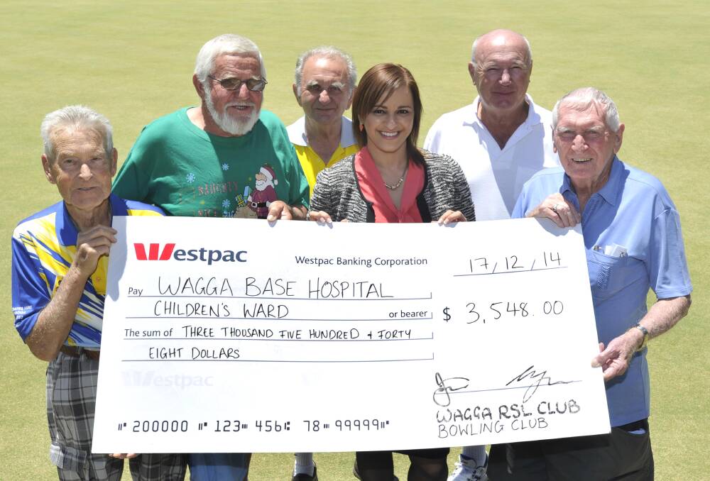 LOOKING BACK: In 2014, Jack (right left) and his fellow bowlers were hard at work raised much-appreciated money for the paediatric ward at Wagga Base Hospital.