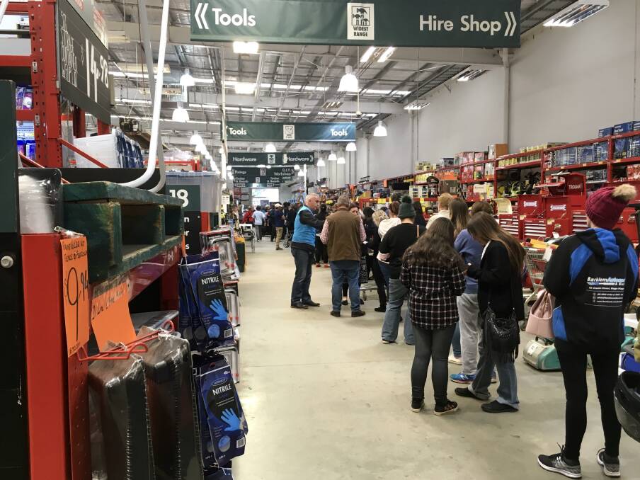 HIGH DEMAND: Hundreds of people queued at the Wagga Bunnings store to take advantage of a flu shot promotion.