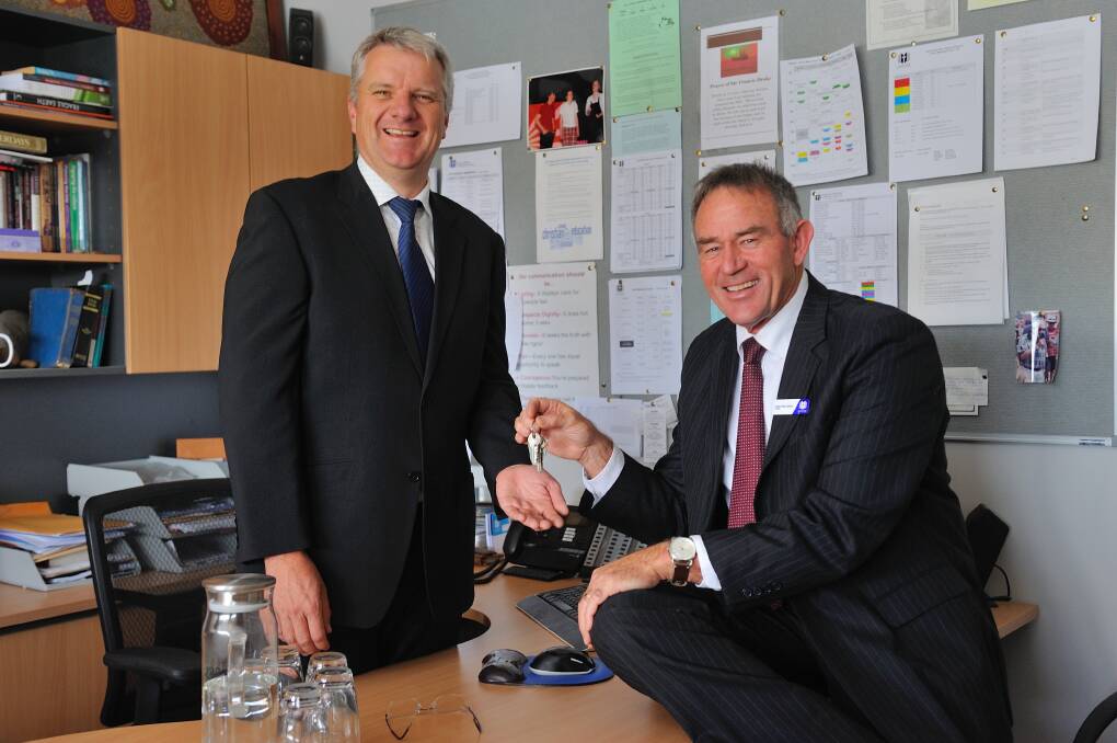 Wagga Christian College principal High MacCallum (right) will be formally handing over the keys to deputy Phillip Wilson and retiring at the end of the school year. 