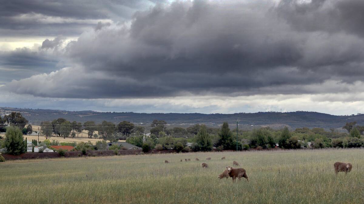 IT'S COMING: A storm cloud rolls in across Wagga's outskirts.