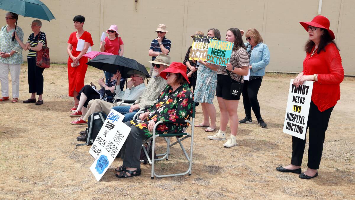 Tumut's Christine Webb (right) during a Wagga rally against regional doctor shortages.