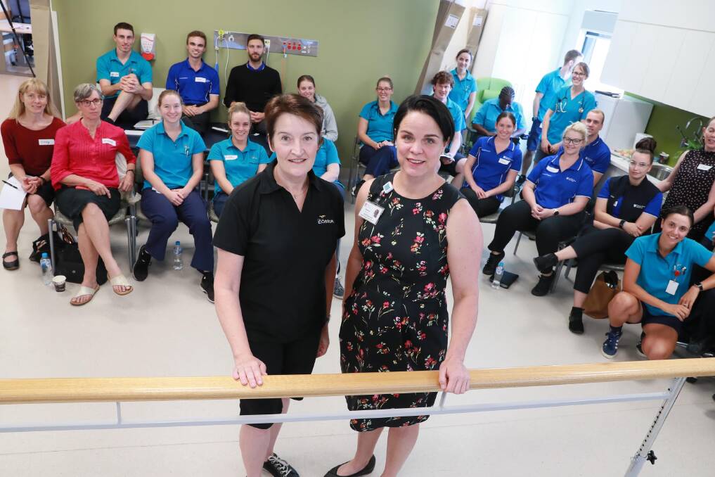 Cathy Howells, an amputee physiotherapist and paralympic physiotherapist and Wagga rehabilitation specialist Rachael McQueen with some of those who were learning about the latest in prosthetics.