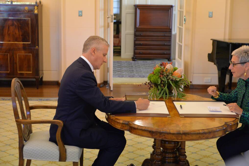 SIGNED AND SEALED: Michael McCormack during the swearing-in ceremony that made him Deputy Prime Minister. Picture: Supplied