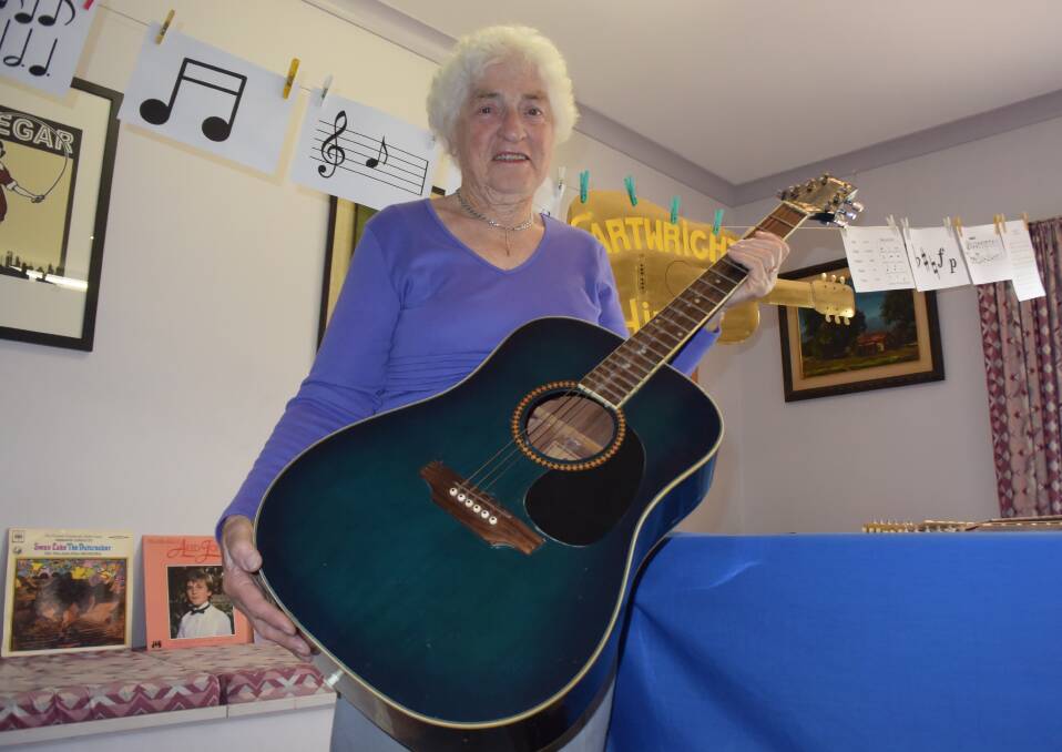 SOUND OF MUSIC: Leola Hull of Cartwrights Hill has put together a display of musical instruments, with some usual inclusions.